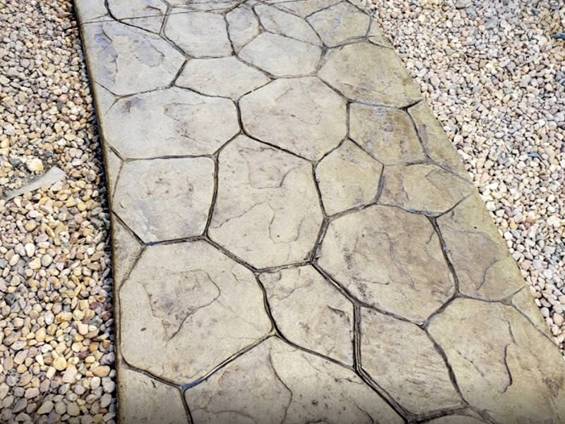 Stone slate stamped concrete walkway sidewalk