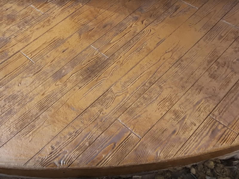 Wood grained stamped pattern colored to look like wood